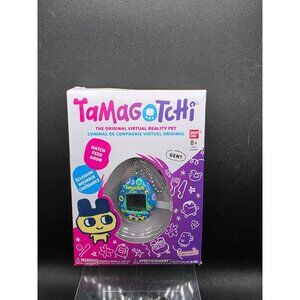 Tamagotchi Gen 1 Virtual Reality Pet - Blue With Flowers
